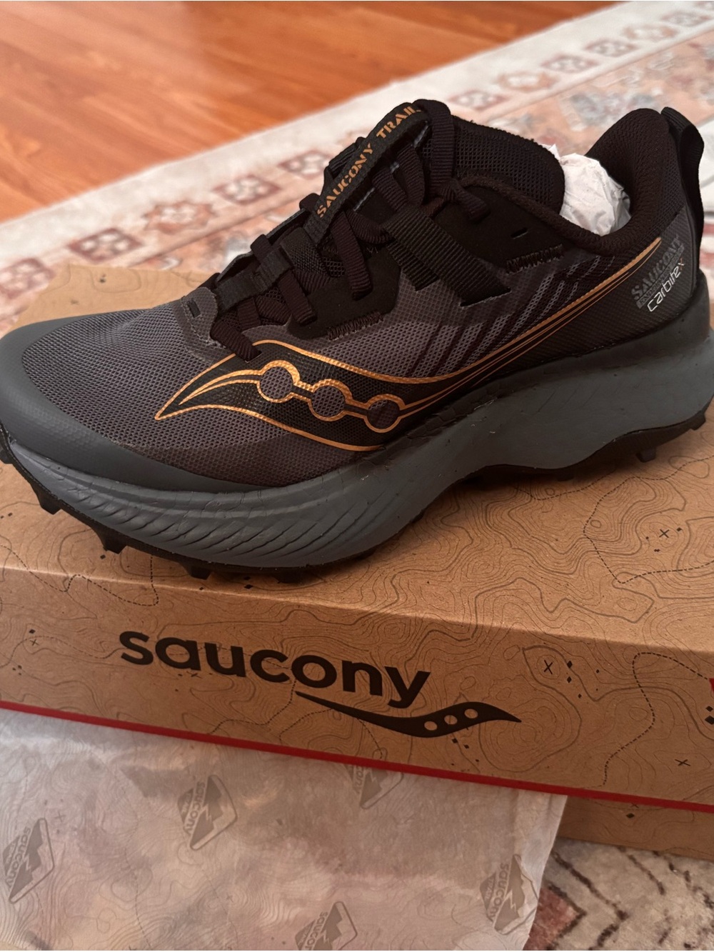 Saucony Black and Gray Trail Running Sneakers with Gold Accent